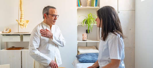 acupuncturist and patient in waiting room