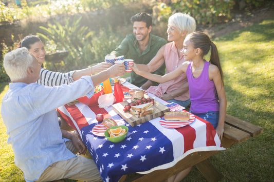 Happy senior couple celebrating memorial day with family