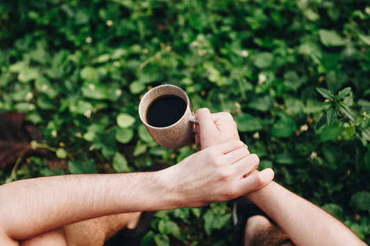 Senior man enjoying coffee during holistic morning routine