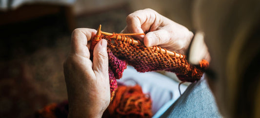Senior woman knitting for relaxing hobby