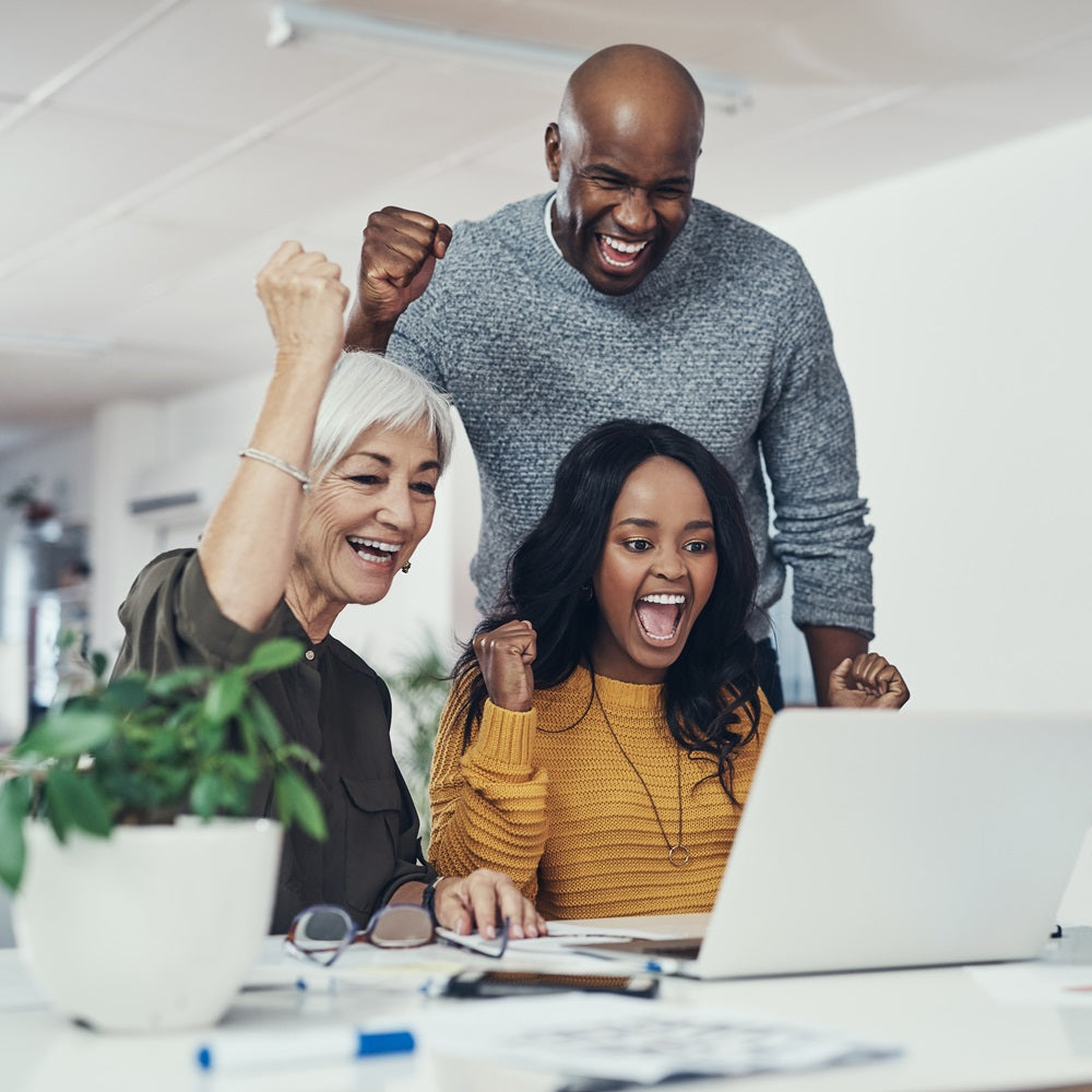 People celebrating business victory